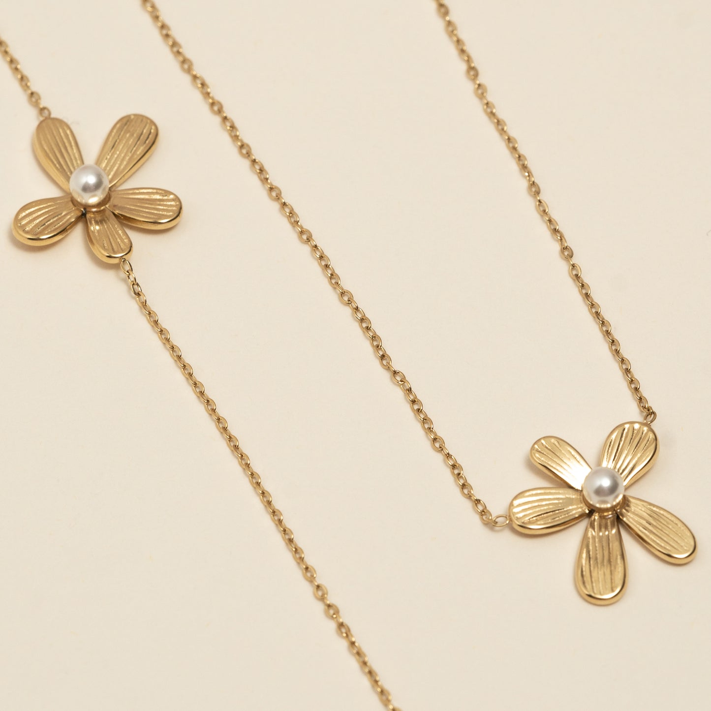 Ensemble collier/bracelet fleur- acier inoxydable