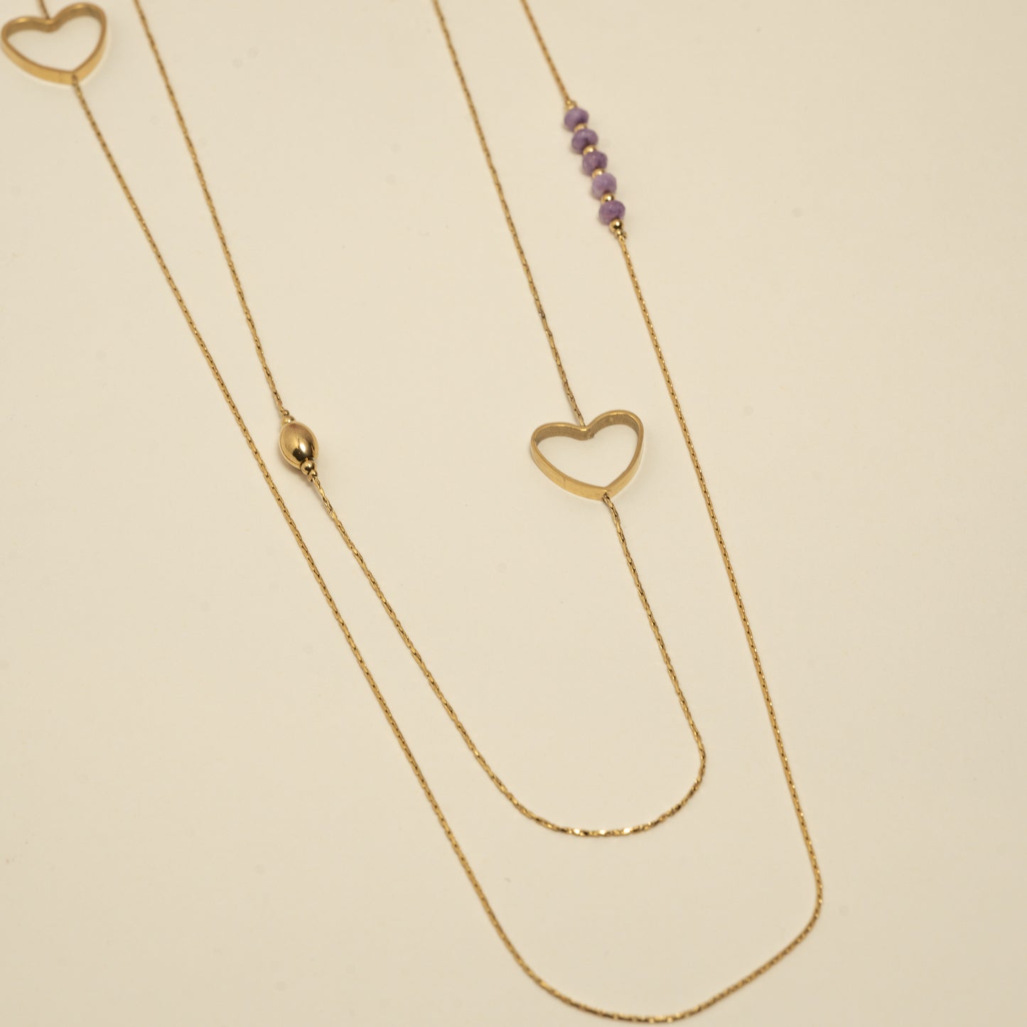 Sautoir double chaîne avec cœur