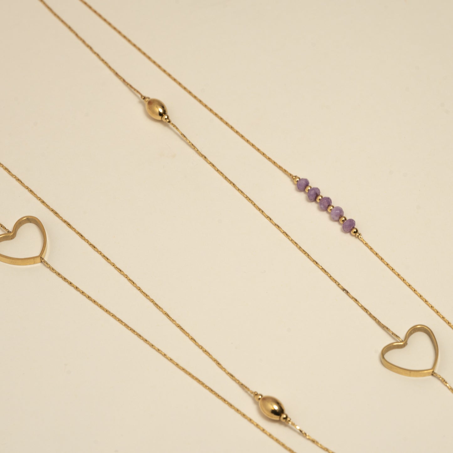 Sautoir double chaîne avec cœur