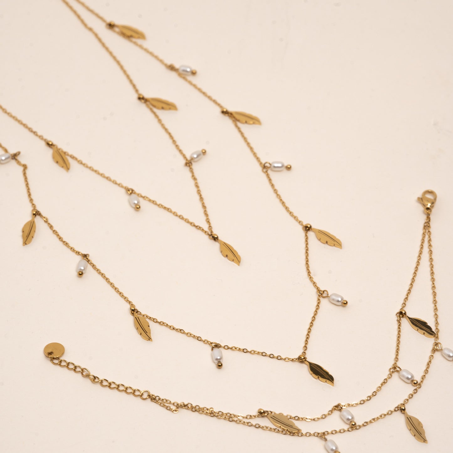 Ensemble collier/bracelet doré- acier inoxydable