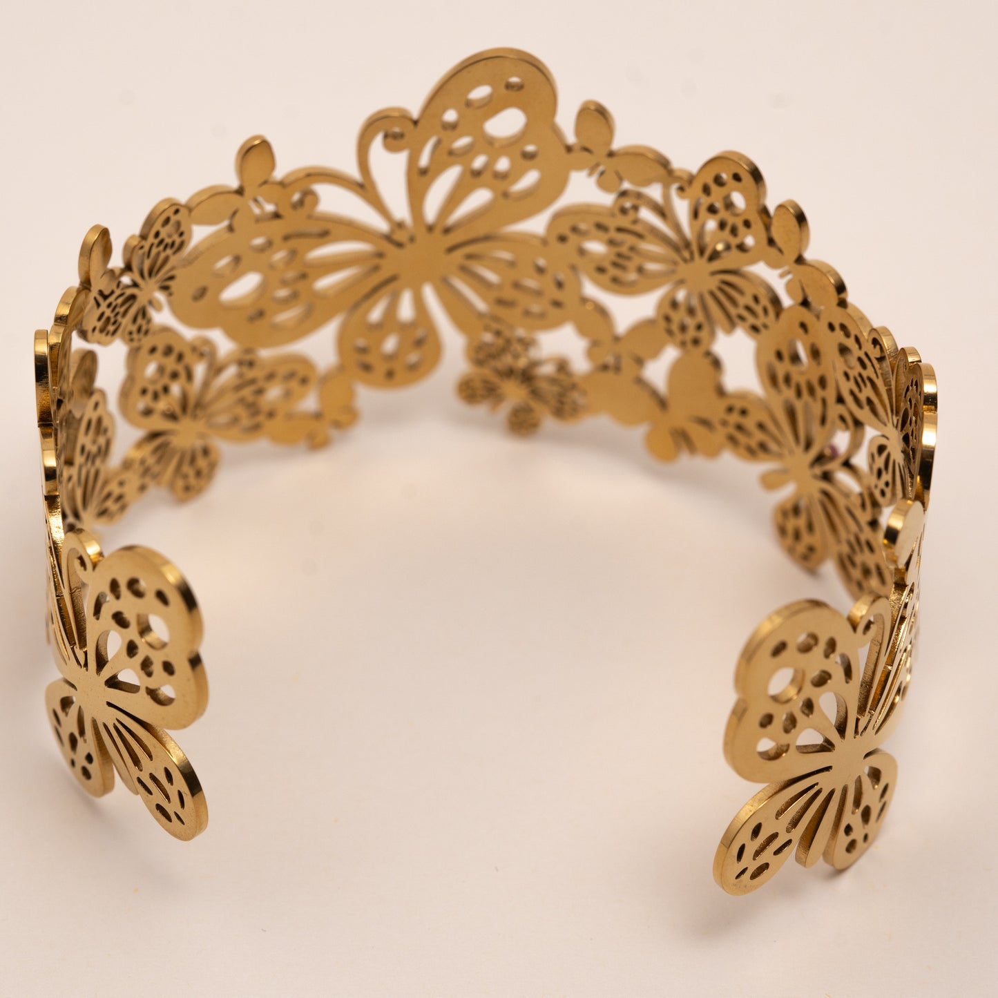 Bracelet papillons dorés ajourés pierres scintillantes – acier inoxydable waterproof